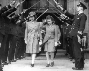 Princess Elizabeth and Princess Margaret attending a wedding in Westminster Abbey