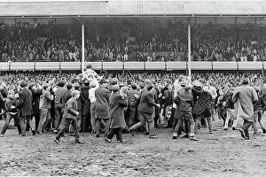 Images Dated 8th December 2023: QPR fans celebrate with their team after winning promotion to Division One 1968