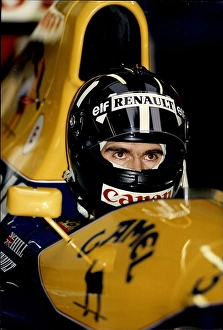 Motoring Prints: Racing driver, Damon Hill, sitting his Formula 1 car at Silverstone 1993