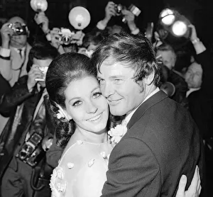 Famous Face Prints: RogerMoorepictured after his wedding to Luisa Mattioli, atCaxtonHall, London 1969