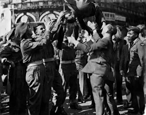 Britain at War Collection: Soldiers celebrate VJ Day