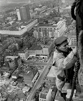 London Prints: A steeplejack works against a backdrop of London - 1963