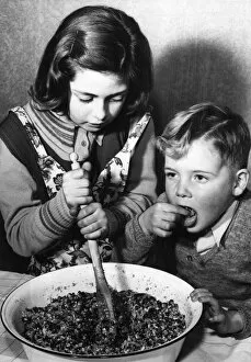 Christmas Past Collection: Stirring the pudding, 1952