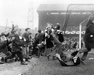 Images Dated 4th January 2024: Sunderland fans on the pitch - FA Cup 1961
