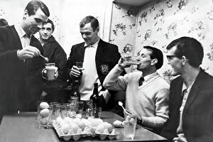 FA Cup Collection: Swansea players preparing for their fourth round in the FA cup with Arsenal by drinking sherry