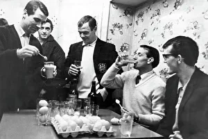 FA Cup Prints: Swansea players preparing for their fourth round in the FA cup with Arsenal by drinking sherry and eggs
