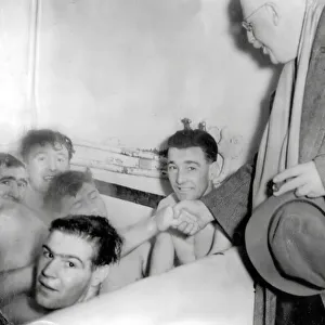 FA Cup Prints: Torquay players relax in the bath after the game Leeds United v Torquay (2-2) - FA Cup 3rd round 1955-56