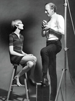 Fashions from the Fifties and Sixties Collection: Twiggy and photographer John Cowan during a photo-shoot at his s