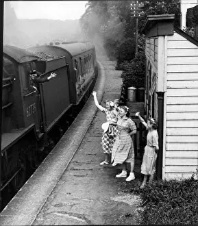Images Dated 28th August 2018: Waving to the train