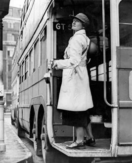 Britain at War Collection: Woman bus conductor in wartime